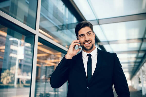 corporate worker talking with someone on phone