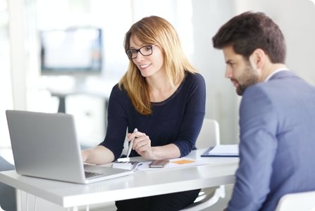 women discussing about work with men